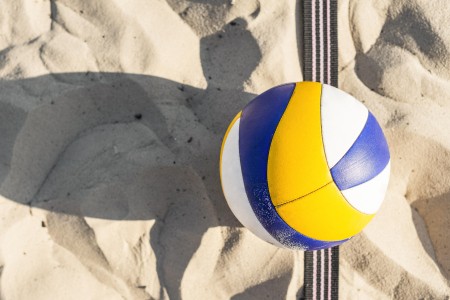 flat-lay-volleyball-beach-sand.jpg
